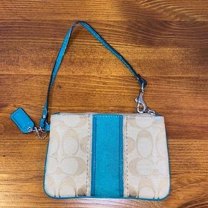 Good condition Coach wristlet wallet. Clean inside and out, never used.